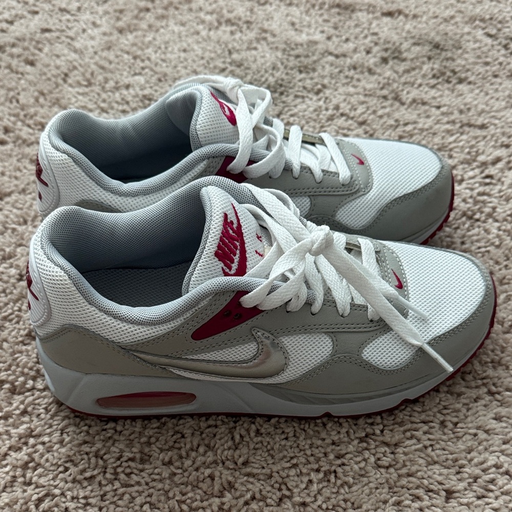 Nike Gray and White Sneakers with Pink Highlights